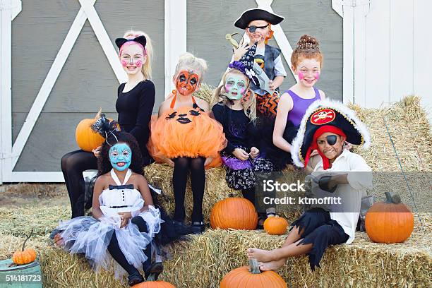 Group Of Children In Costumes At Halloween Party Stock Photo - Download Image Now - Face Paint, Halloween, Child