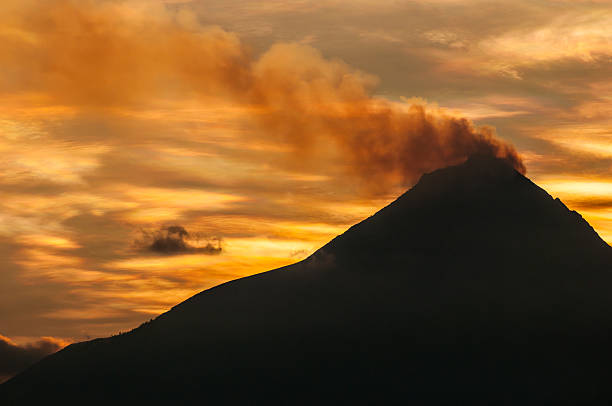 Merapi volcano Merapi volcano on sunrise viewing from Borobudur Temple(silhouette scene) erupting photos stock pictures, royalty-free photos & images