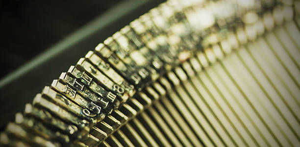istock Hammer keys on an old type writer. Vintage filter. 514214000