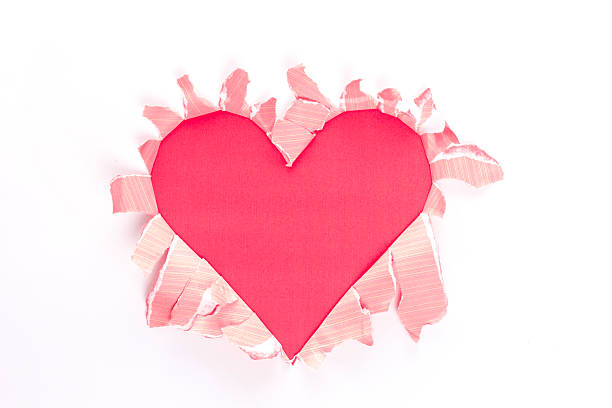 istock Sheet of paper with a Heart shape hole 514214077