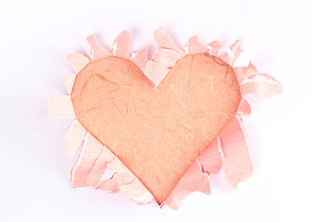 istock Sheet of paper with a Heart shape hole 514214081