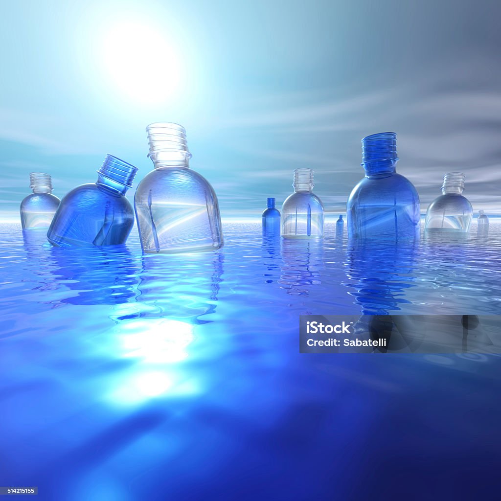 Plastic bottles in water backlight several bottles sailing in the sea in hard sunlight Sea Stock Photo