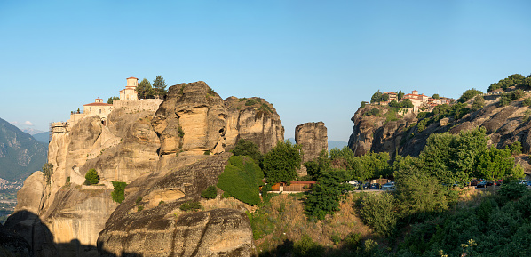 The Holy Monastery of Varlaam and Holy Monastery of Great Meteoron in Meteora - complex of Eastern Orthodox monasteries at sunrise, Greece