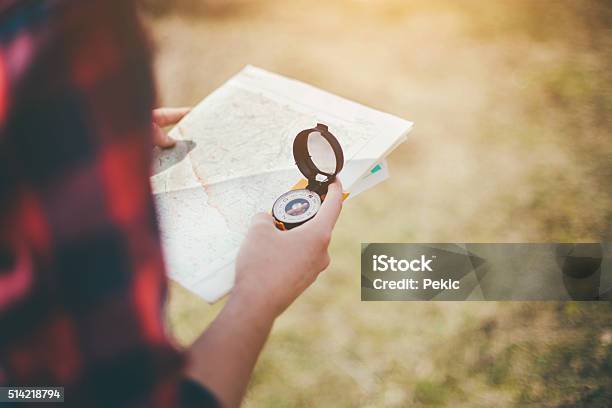 Hike Using Compass Hikers Using Compass And Map In Nature Stock Photo - Download Image Now ...