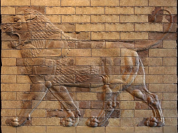 istock Persian Achaemenid Lion Bas Relief on molded terracotta Bricks 514219152