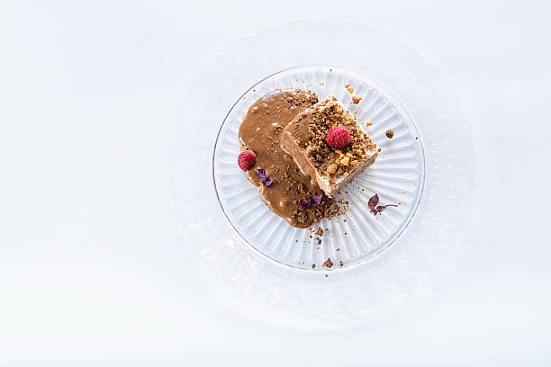 coockies cake Cookies cake with chocolate sauce and raspberry on white background beatifull stock pictures, royalty-free photos & images