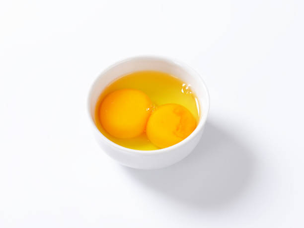 istock Egg whites and yolks in bowl 514222252