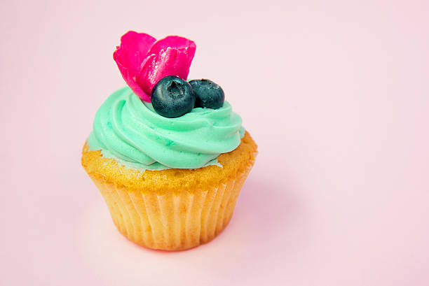 istock Cupcakes with butter cream and vanilla 514222770