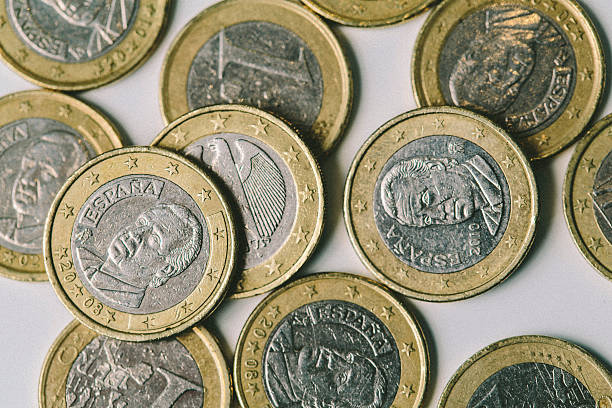 istock Many Euro coins close up on a white background 514224492