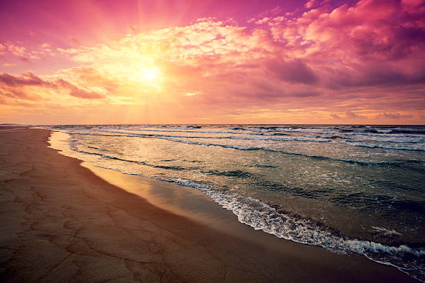 istock Purple sunrise over sea 514225666