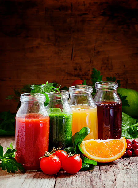 istock Bottles with fresh juices from fruits and vegetables 514226928
