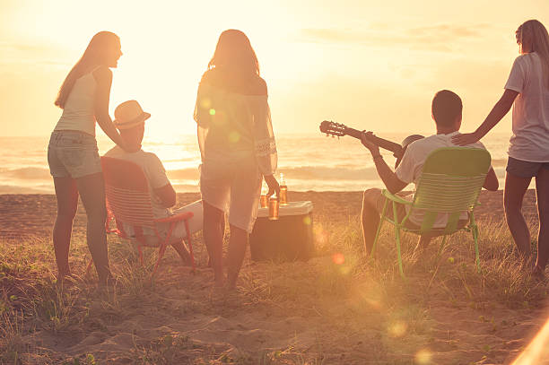 istock Group of friends relaxing at the beach. 514227268