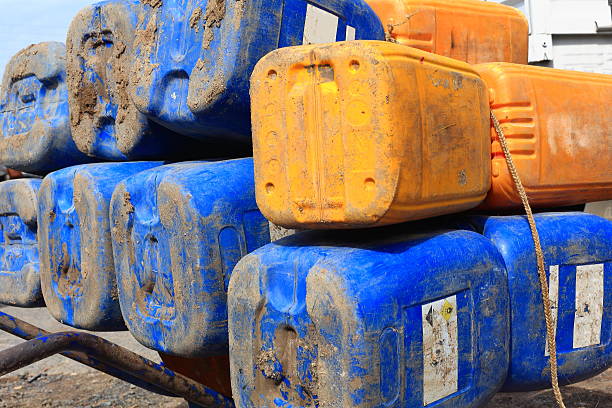 istock Big blue and yellow plastic jerrycans. Afrera-Ethiopia. 0170 514229006