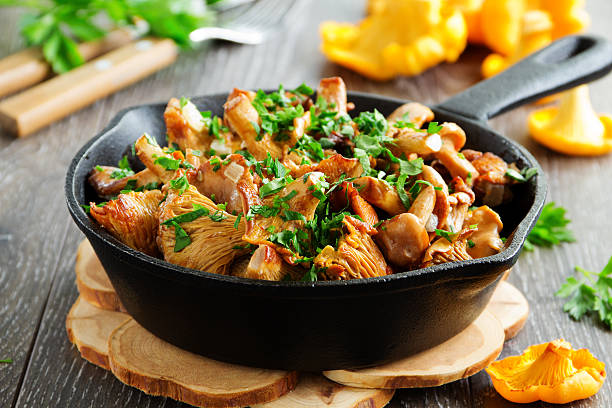 istock Fried chanterelle mushrooms in a creamy sauce 514229622