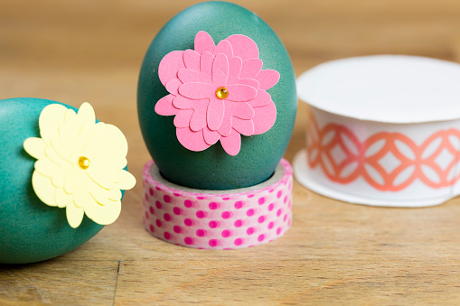 Easter egg ribbons, cutouts, stones and designer tape for coloring and decorating for the holiday