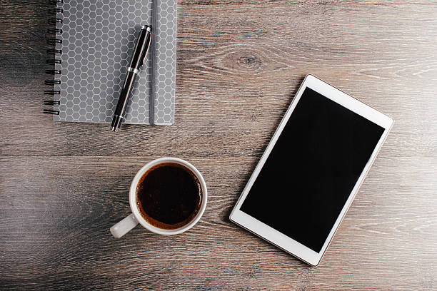 istock Cup of coffee on the table 514230842