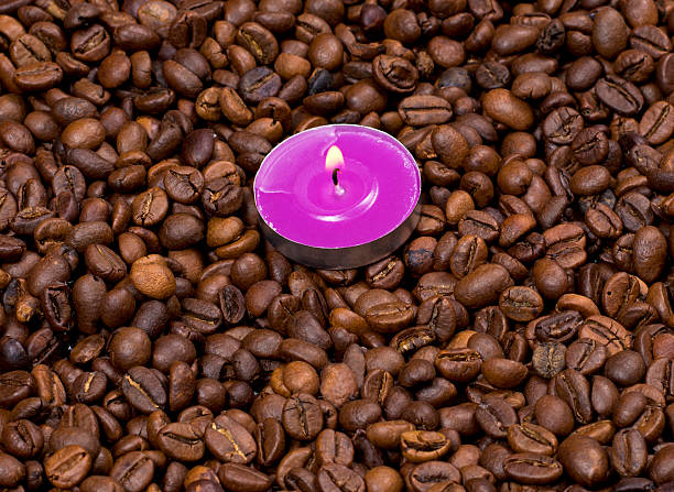 istock the burning candle on coffee grains 514231520