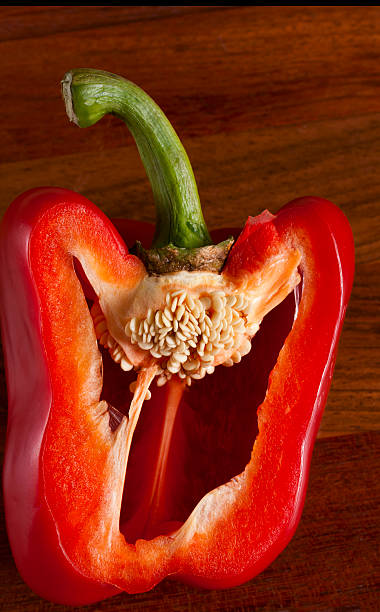 istock cut red pepper. Visible grains of pepper 514233622