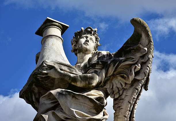 istock Angel with Column looks at the heaven 514234824