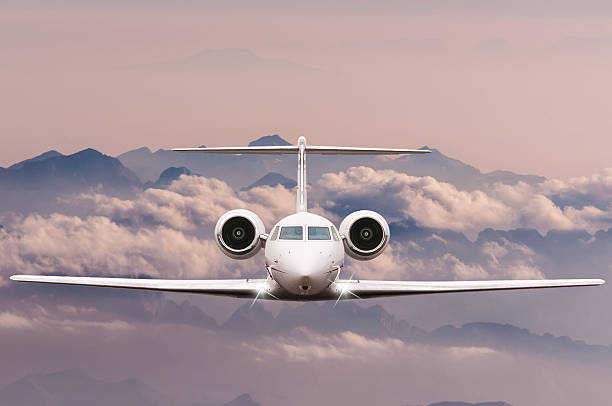 istock Travel concept. Front view of Jet airliner in flight with 514235268