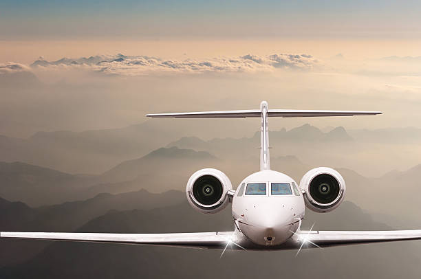 istock Travel concept. Airplane fly over clouds and Alps mountain on 514235692