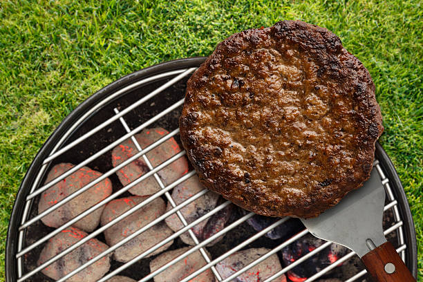 Backyard Cookout with Hamburger on Spatula Outdoors