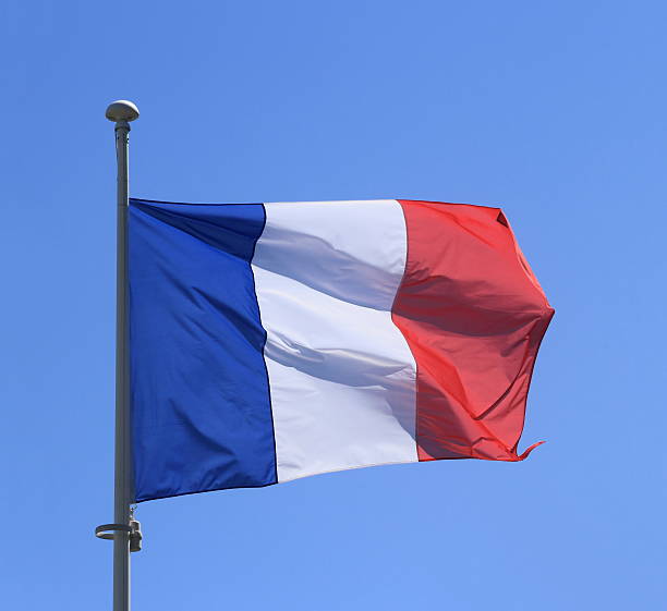 istock France flag on blue sky 514245403