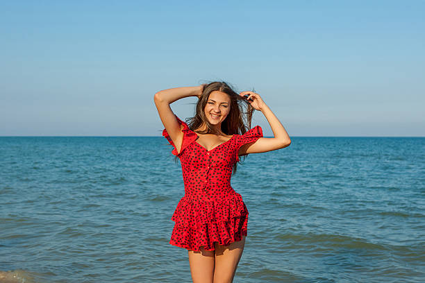 Free Stock Photo of Woman in Red Dress Standing on Beach | Download ...