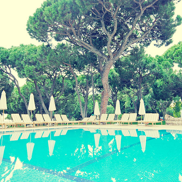 summer resort with swimming pool, Algarve, Portugal, vintage square image, instagram effect