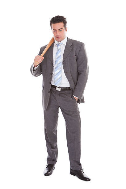 istock Businessman Holding Baseball Bat 514248885