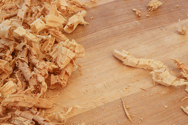istock Spokeshave Sapele Hardwood Board Chip Shavings 514249975