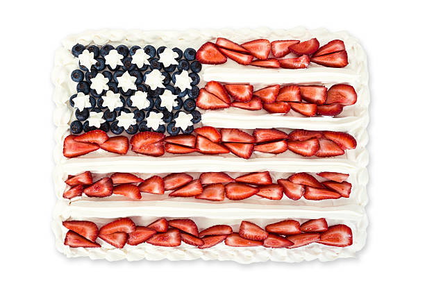 American flag cake decorated with blueberries and strawberries