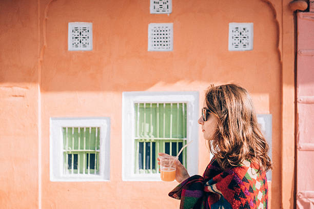 Woman drinking orange juice