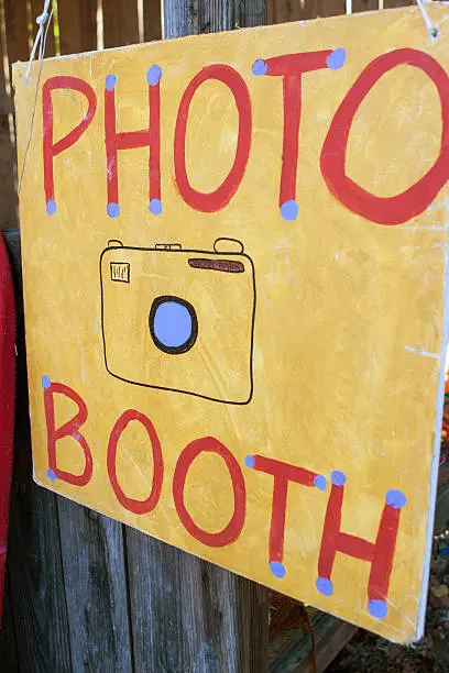 Photo of Handmade Sign Directs Carnival Patrons To Photo Booth