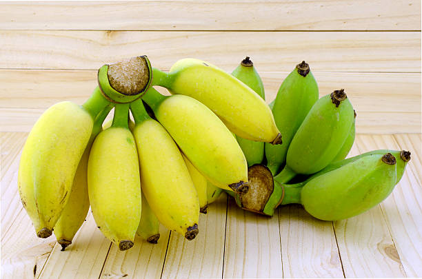 istock Cultivated Banana on Natural Wood Background. 514260146
