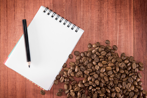 Blank notebook with coffee bean