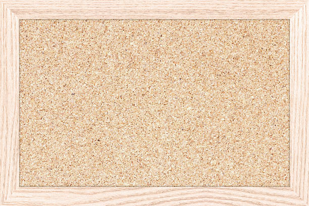 istock Empty bulletin board with a wooden frame, cork board texture. 514264240