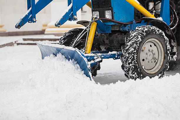 istock Tractor cleaning snow in city 514266226