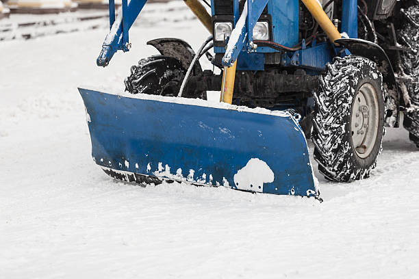 istock Tractor cleaning snow in city 514266586