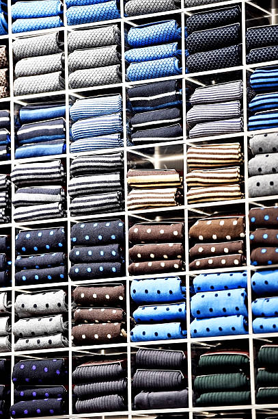 istock Silk neckties on shelves in a store 514267234