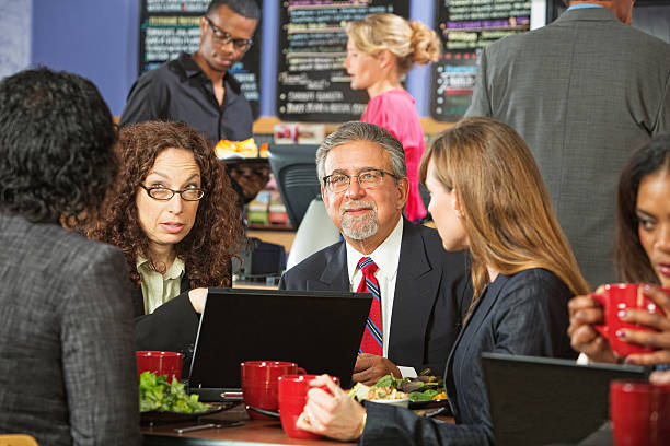 istock Group of Business People in Cafe 514268304