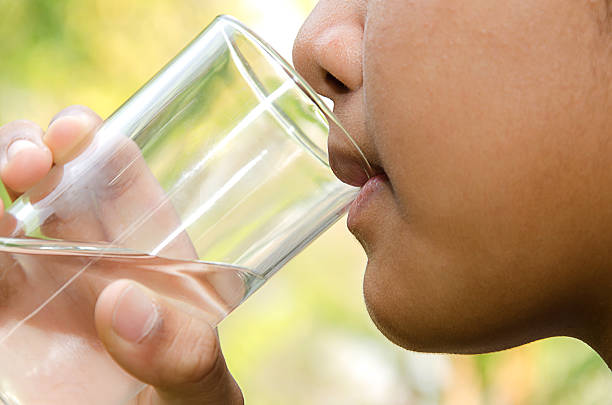 istock drinking water in the glass. 514269872