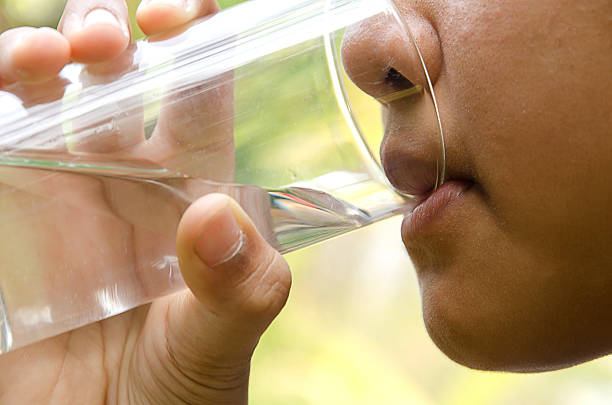 istock drinking water in the glass. 514269908
