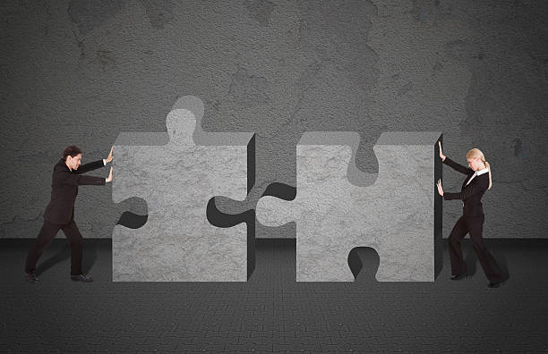 istock Business People Joining Puzzle Pieces 514270347