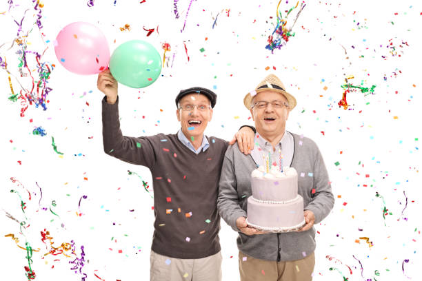 istock Two senior gentlemen celebrating birthday 514270576