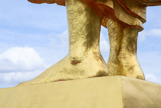 istock Feet of buddha statue 514270751