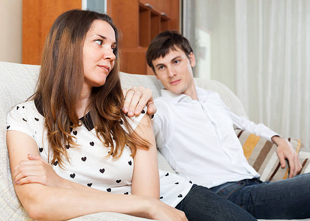 istock Man asking for forgiveness from young woman 514271247