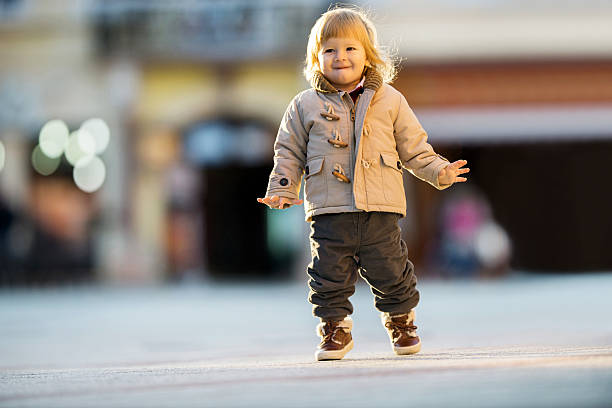 istock Little boy in the street. 514271527