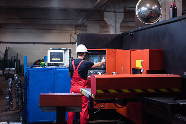 istock operating a red-painted heavy-duty machinery 514274304