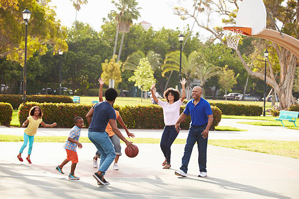 istock Multi Generation Family Playing Basketball Together 514274413